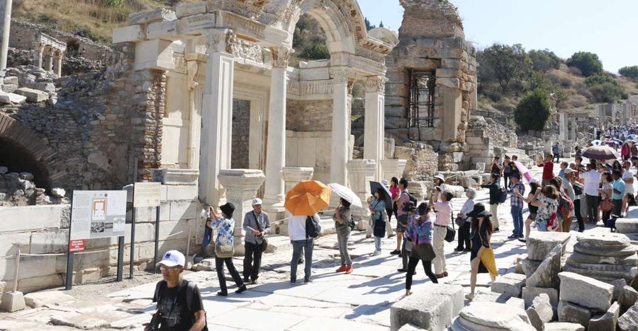 Kusadasi or Selcuk: Full-Day Ephesus Tour with Lunch - Walking through Ephesus on marble streets