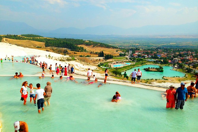 Pamukkale and Hierapolis Full-day Guided Tour from Kusadasi - Walking through Hierapolis after the springs